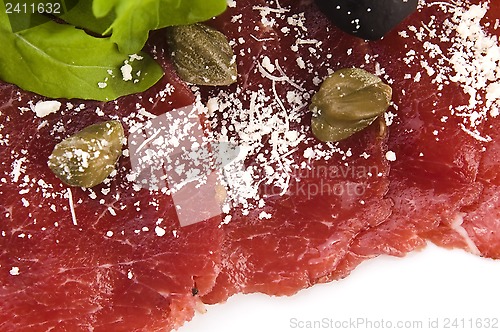 Image of Beef carpaccio with rucola and parmesan 