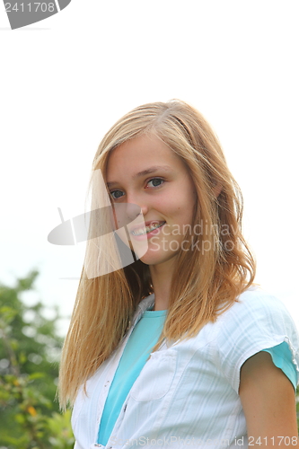 Image of Attractive teenage girl with dental braces