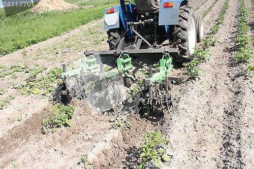 Image of equipment on a tractor for weed in agriculture