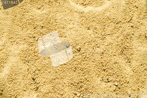 Image of texture of yellow sand close up