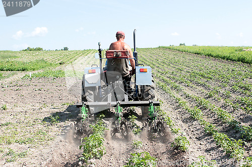 Image of special equipment on a tractor for weed