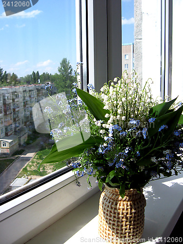 Image of Bouquet of lilies of the valley and blue flowers