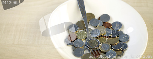 Image of Eating some coins