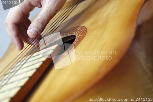 Image of Playing the guitar