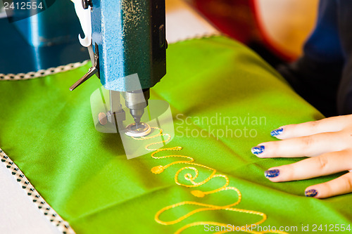 Image of Lady hand at sewing