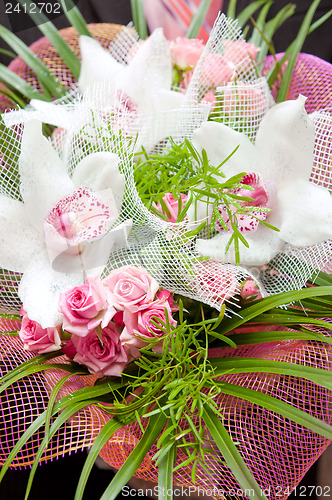 Image of wedding bouquet with rose and orchid