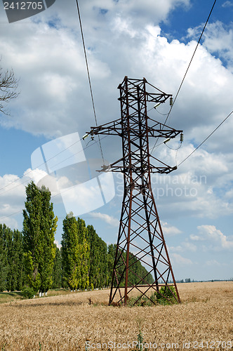 Image of power transmission tower on field