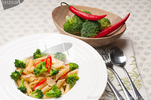 Image of Italian penne pasta with broccoli and chili pepper