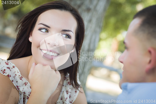 Image of Mixed Race Romantic Couple Portrait in the Park