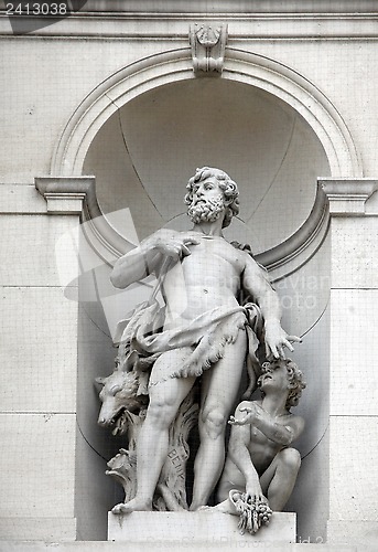 Image of Burgtheater, Vienna, statue shows an allegory of egoism