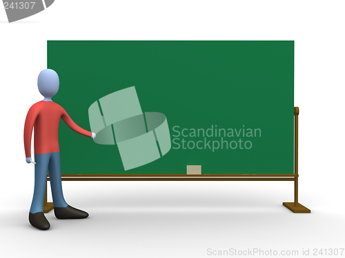 Image of Teacher in front of a blackboard.