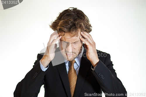 Image of Hurting businessman with migraine