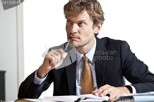 Image of Thoughtfull businessman