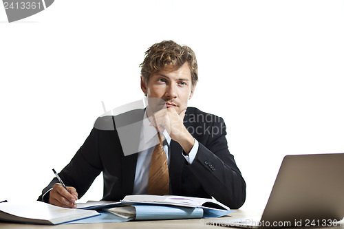 Image of Businessman working out a problem