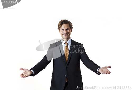 Image of Smiling businessman saying welcome