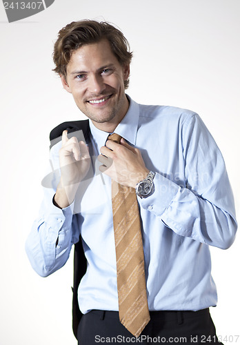 Image of Smiling businessman casual looking