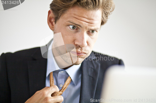 Image of Overworked businessman