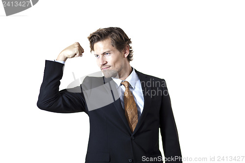 Image of Strong businessman flexing