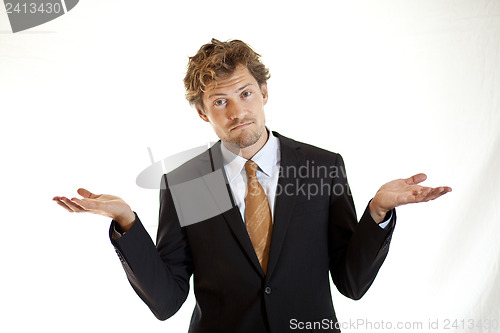 Image of Bewildered businessman looking confused