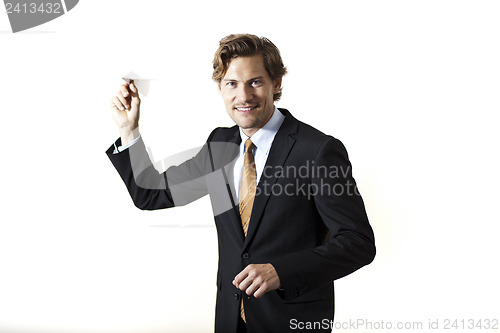 Image of Businessman throwing paper airplane at you