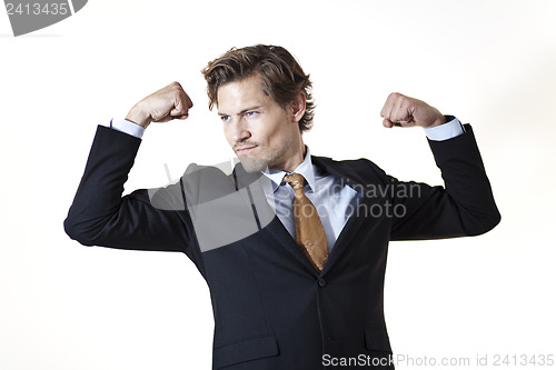 Image of Flexing businessman