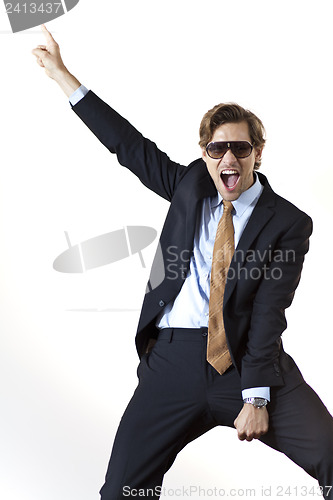 Image of Cool businessman letting loose