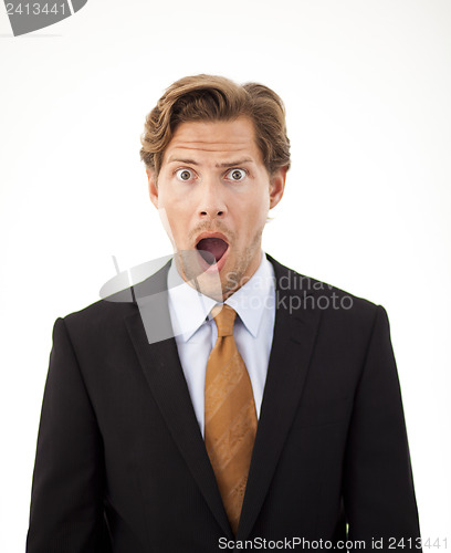 Image of Shocked businessman looking at camera