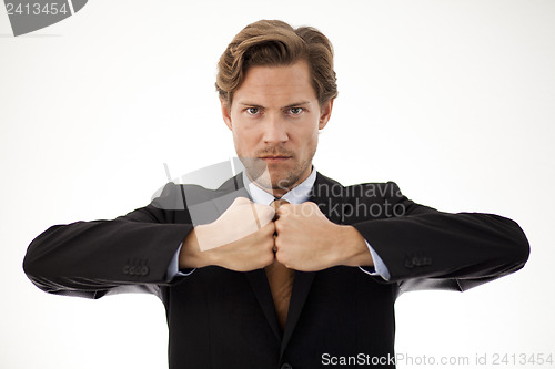 Image of Businessman facing his fists in a sign of strength