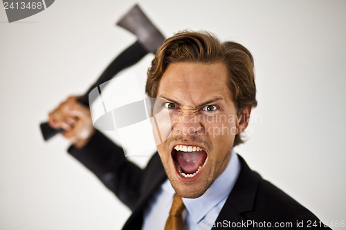 Image of Businessman Wielding Axe