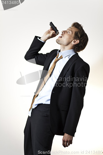 Image of Drinking businessman