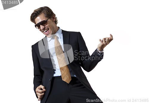 Image of Cool businessman playing air guitar