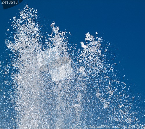 Image of Beautiful fountain on the background of blue sky