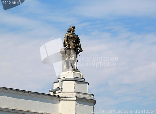 Image of Statue of a girl with a sea helm