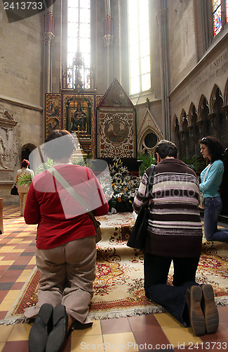 Image of On Good Friday, people pray in front of God's tomb in the Zagreb Cathedral