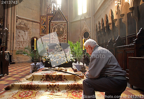 Image of On Holy Saturday, people pray in front of God's tomb in the Zagreb Cathedral