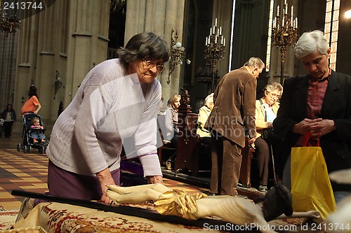 Image of On Holy Saturday, people pray in front of God's tomb in the Zagreb Cathedral