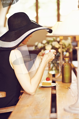 Image of Stranger in a cafe