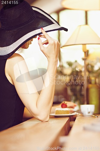 Image of Stranger in a cafe