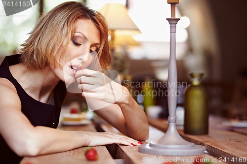 Image of Girl with strawberries