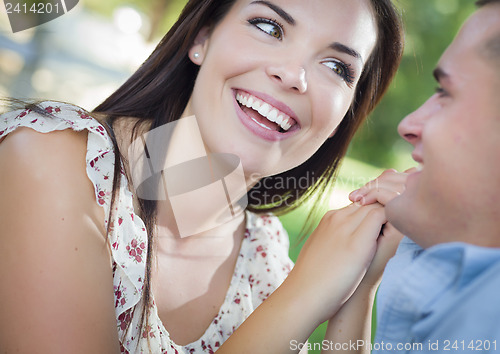 Image of Mixed Race Romantic Couple Portrait in the Park