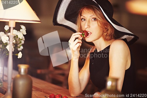 Image of Girl with strawberries