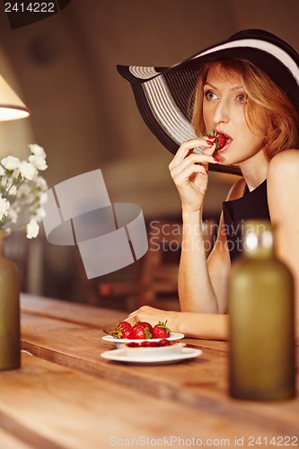 Image of Girl with strawberries