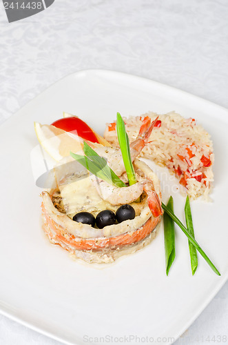 Image of fish with rice and vegetables