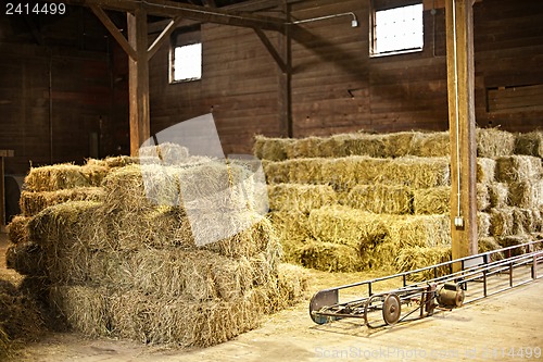 Image of Interior of barn with hay bales