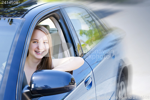 Image of Teenage girl learning to drive
