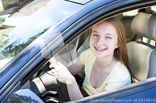 Image of Teenage girl learning to drive