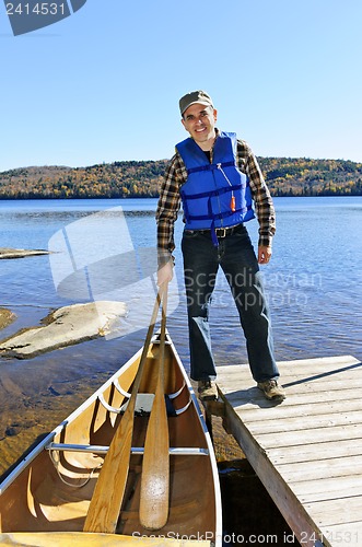 Image of Man with canoe