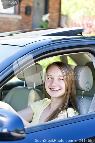 Image of Teenage girl learning to drive