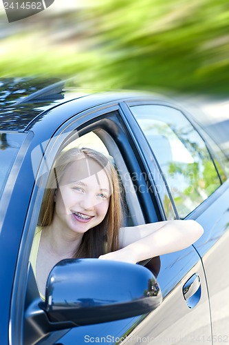 Image of Teenage girl learning to drive