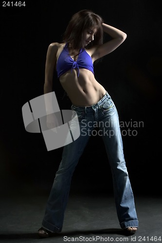 Image of figure in jeans